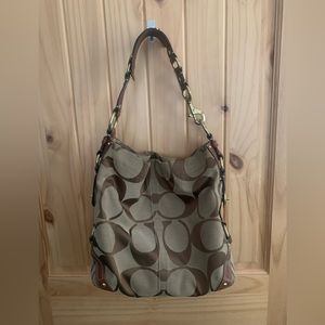 COACH Signature Large Carly. This bag is used, but in great condition.